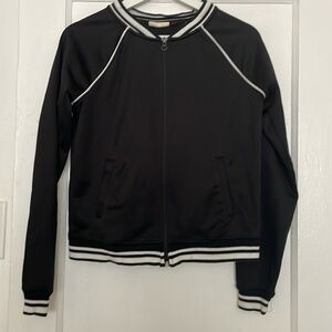 Black jacket white bands on neckline and  sleeves